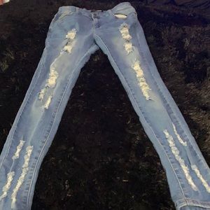 Medium/ dark wash distressed jeans
